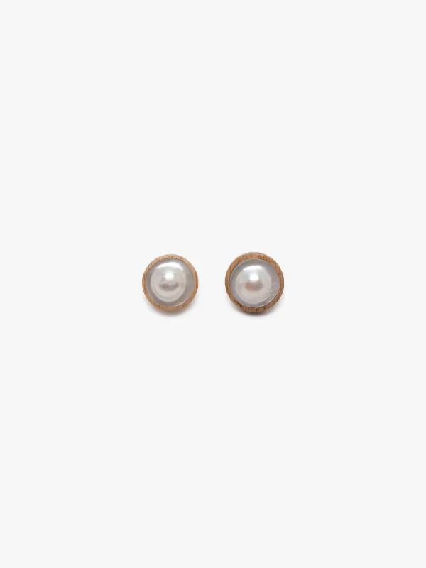 Earrings: Mabé pearl, light oak sold by Monies