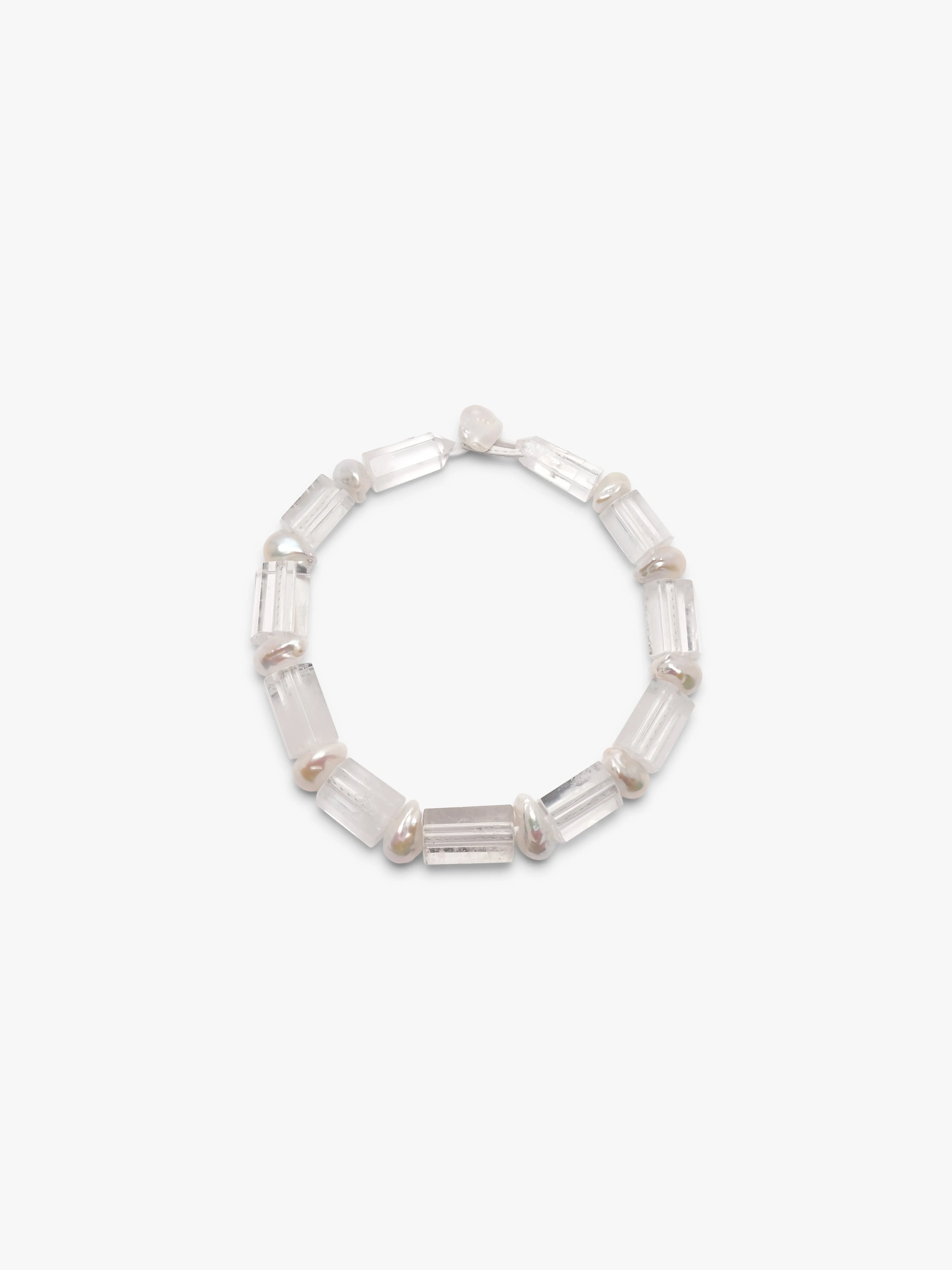 Necklace: mountain crystal, baroque pearl sold by Monies