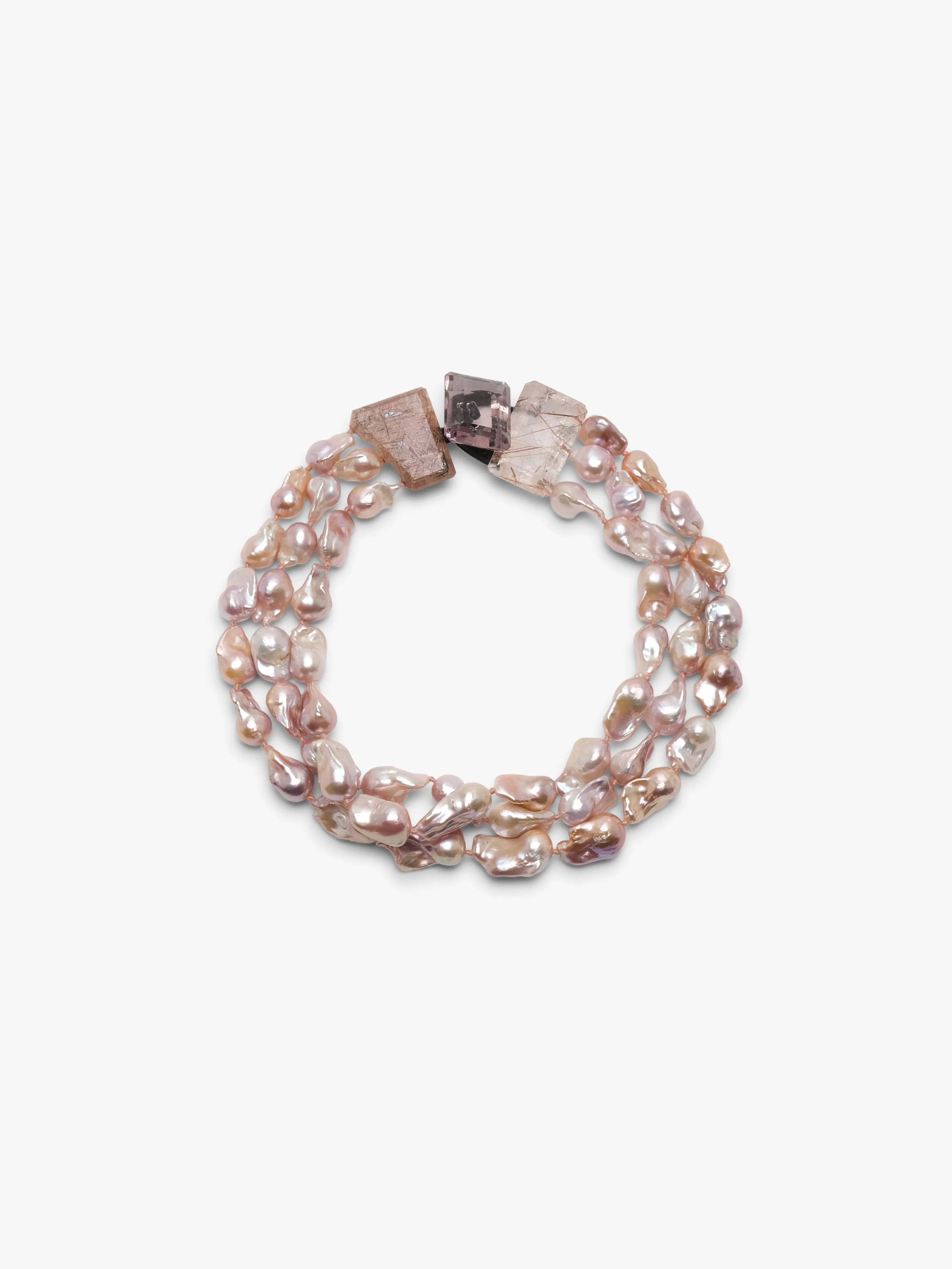 Necklace: ruthilated quartz, amethyst, baroque pearl sold by Monies