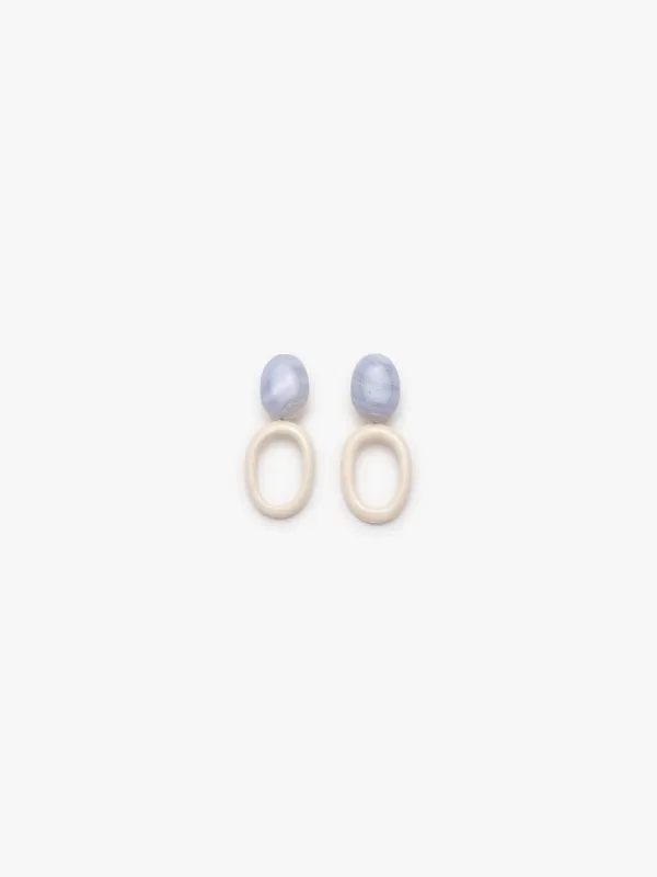 Earrings: chalcedony, bone sold by Monies
