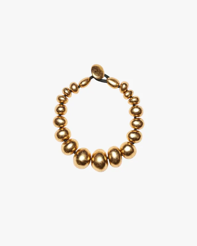 Hanoi necklace: polyester, goldfoil sold by Monies