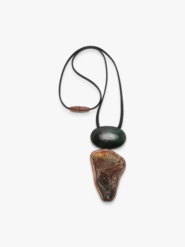 Pendant: nephrite, flint, walnut made by Monies