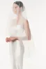 Signature Fingertip Length Veil sold by Monique Lhuillier
