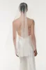 Signature Fingertip Length Veil sold by Monique Lhuillier