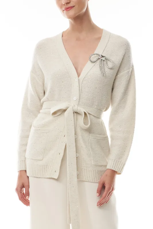 Sparkle Cardigan With Bow Brooch sold by Monique Lhuillier