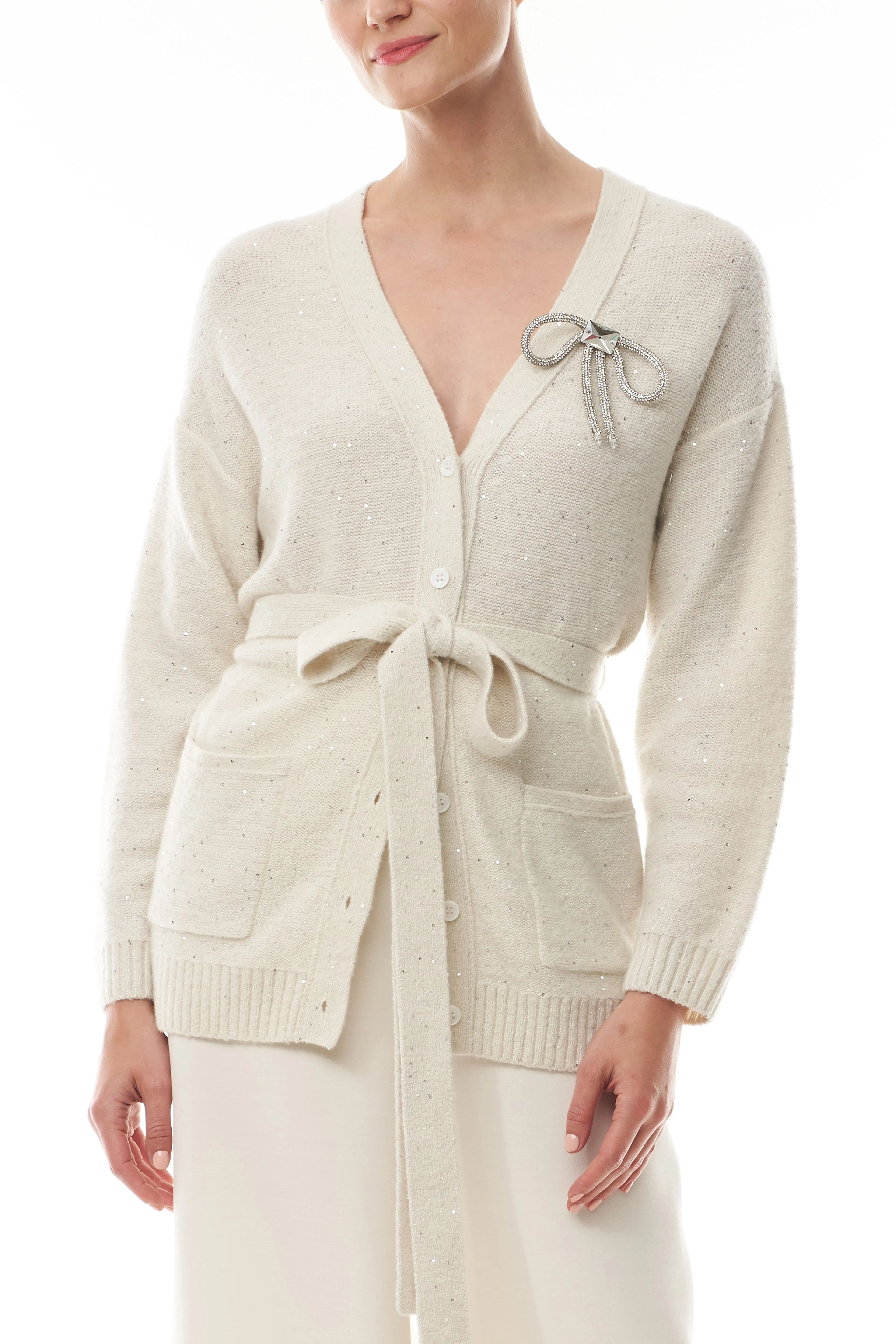 Sparkle Cardigan With Bow Brooch sold by Monique Lhuillier