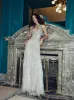 Shimmering Silver Tulle Gown sold by Monique Lhuillier