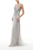 Shimmering Silver Tulle Gown sold by Monique Lhuillier