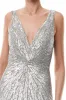 Shimmering Silver Tulle Gown sold by Monique Lhuillier