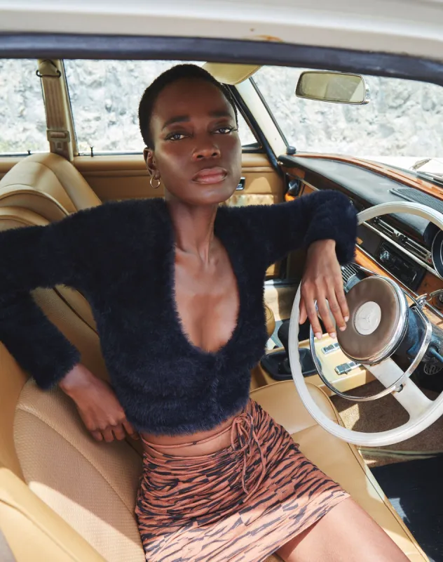 Ejon Mini Skirt in Abstract Tiger Brown sold by Motel Rocks