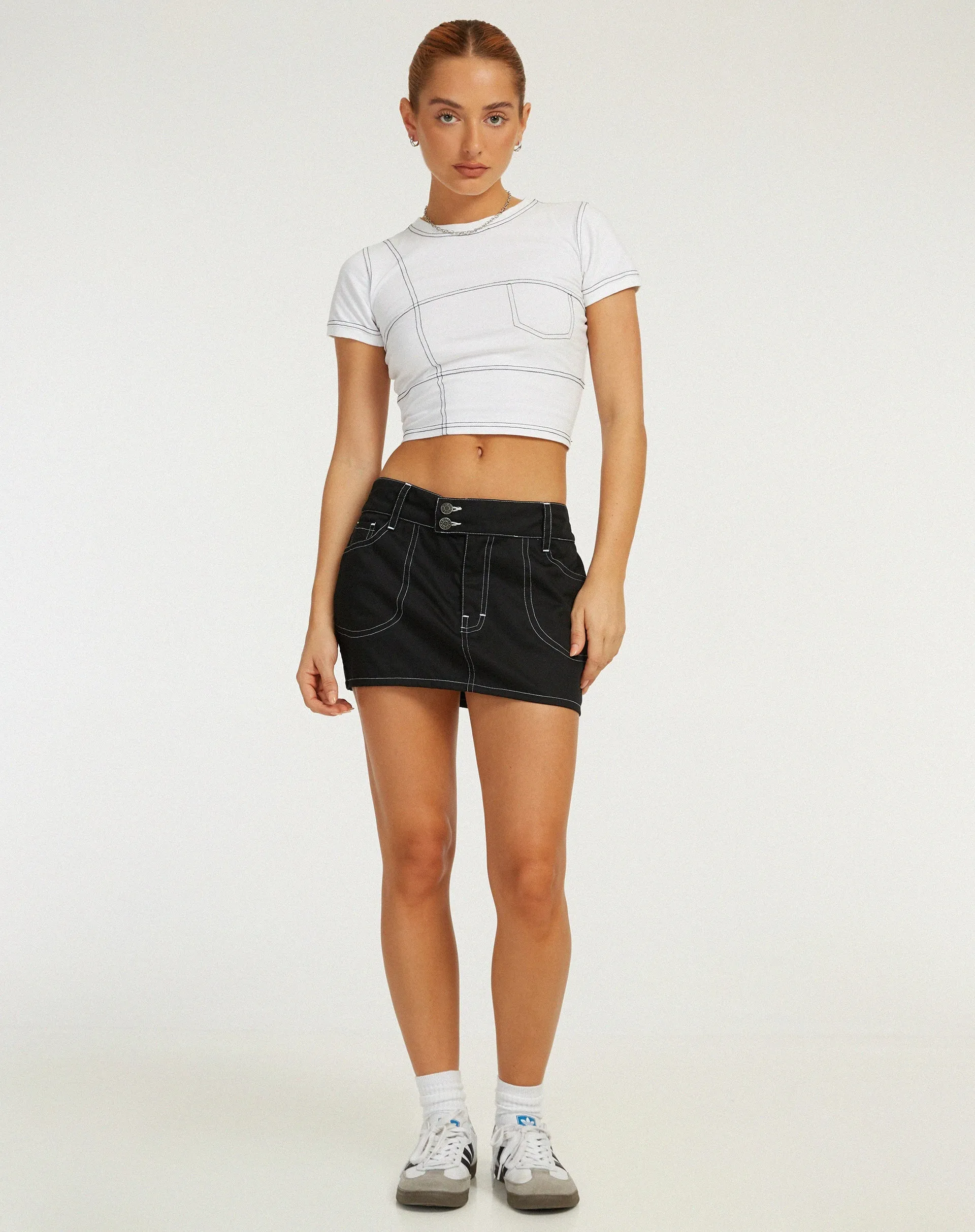 Dipta Mini Skirt in Black with White Stitch sold by Motel Rocks