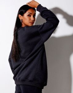 Glo Sweatshirt in Black 'Angel Energy' sold by Motel Rocks