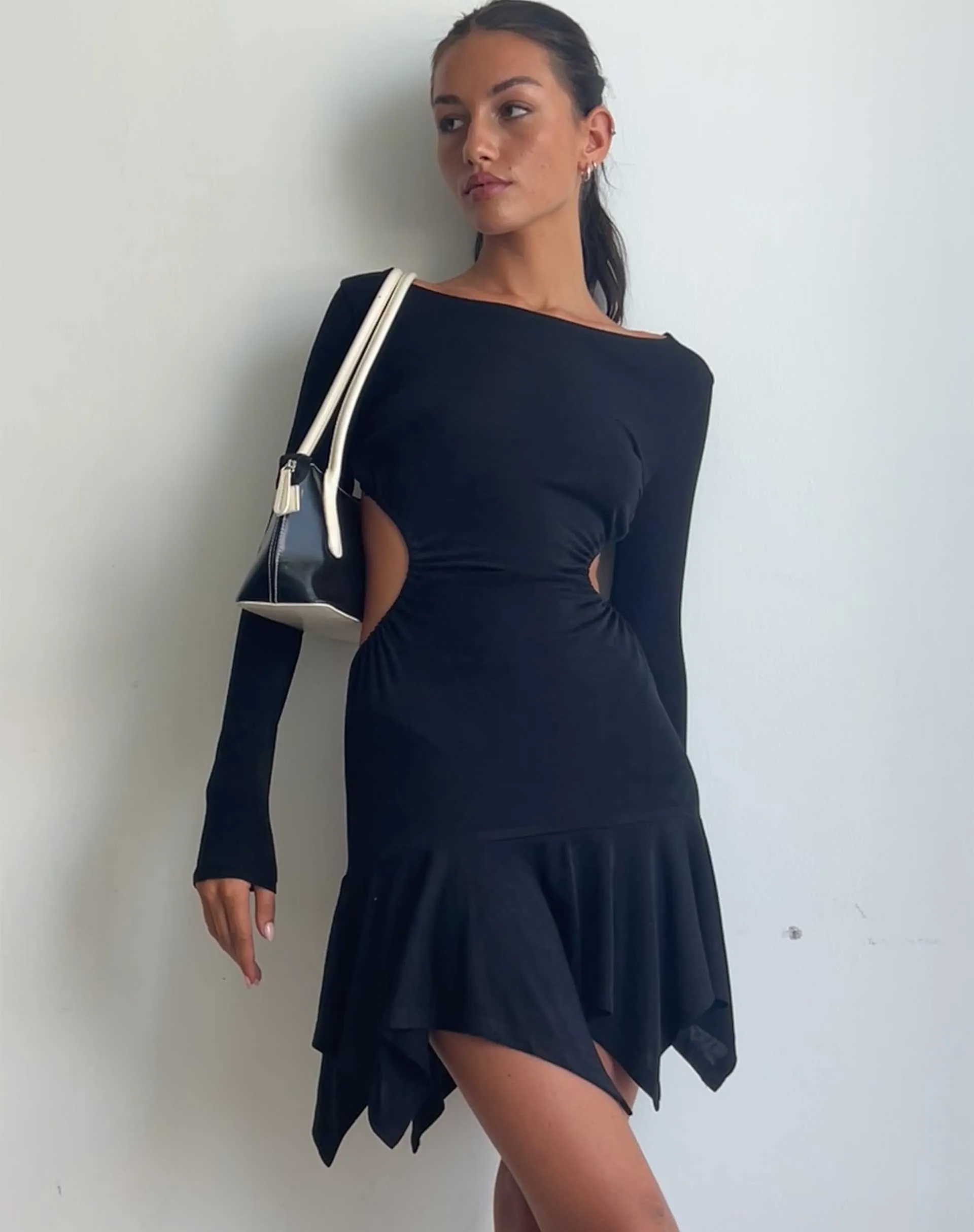 Cordelia Long Sleeve Cut Out Mini Dress in Black sold by Motel Rocks