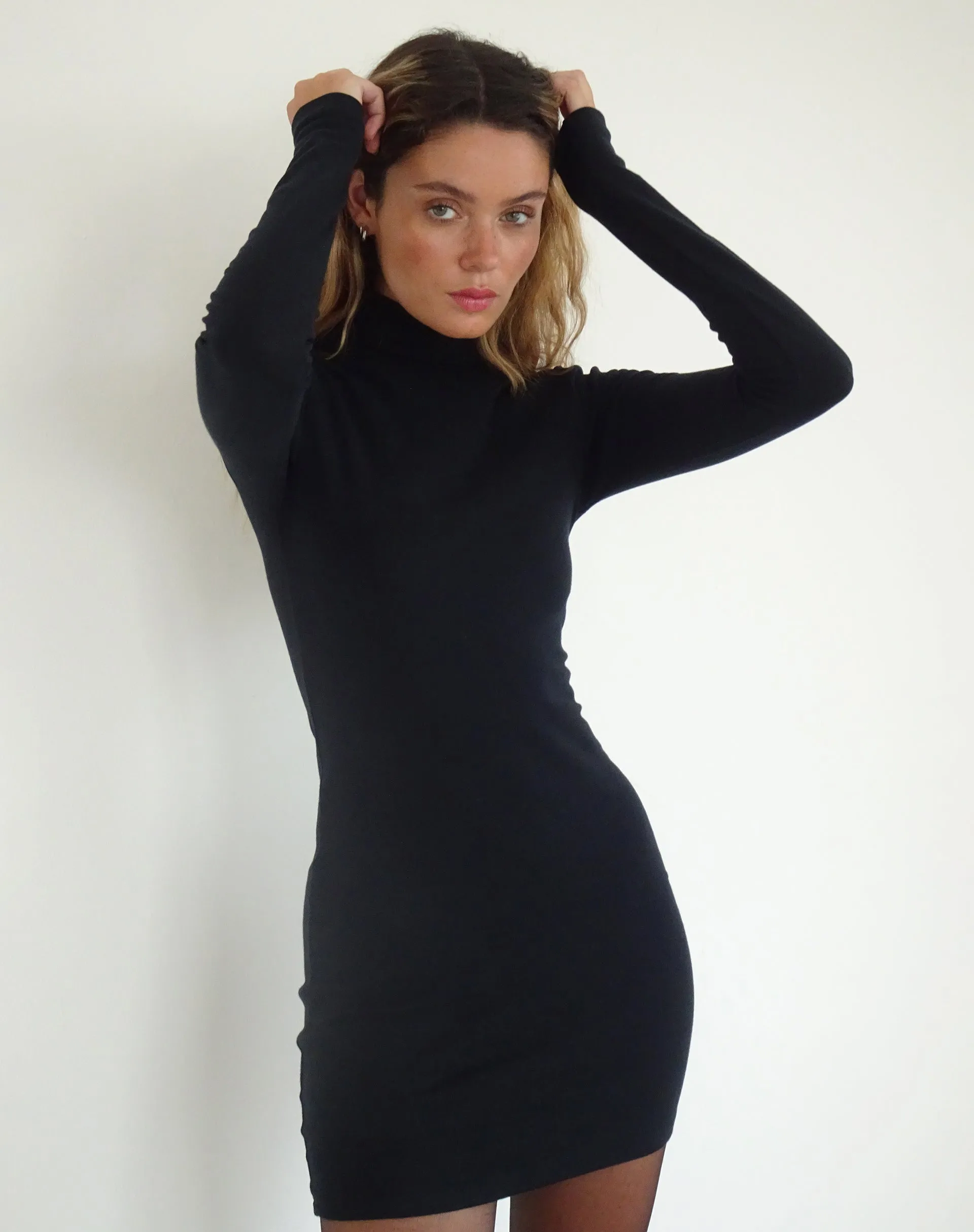 Yrion Turtle Neck Bodycon Mini Dress in Black sold by Motel Rocks