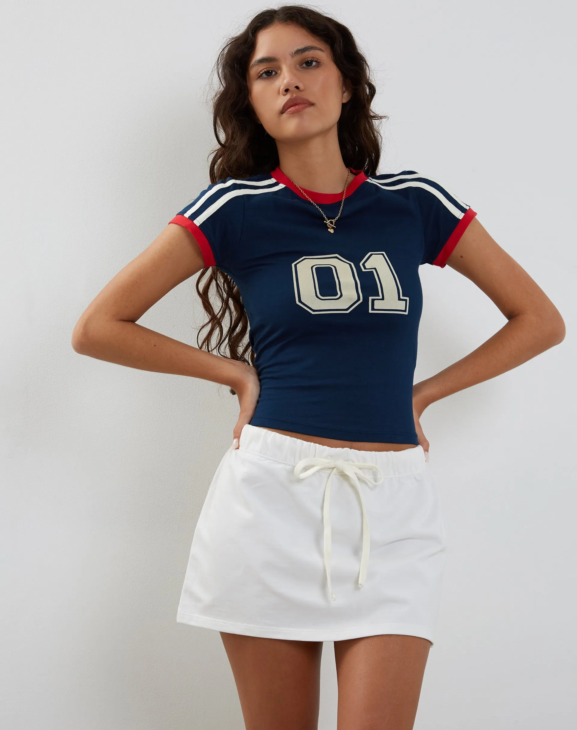 Dheca Mini Skirt in White sold by Motel Rocks