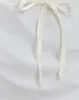 Dheca Mini Skirt in White sold by Motel Rocks