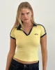 Isda Top in Lemonade with Navy Binding and M Emb sold by Motel Rocks