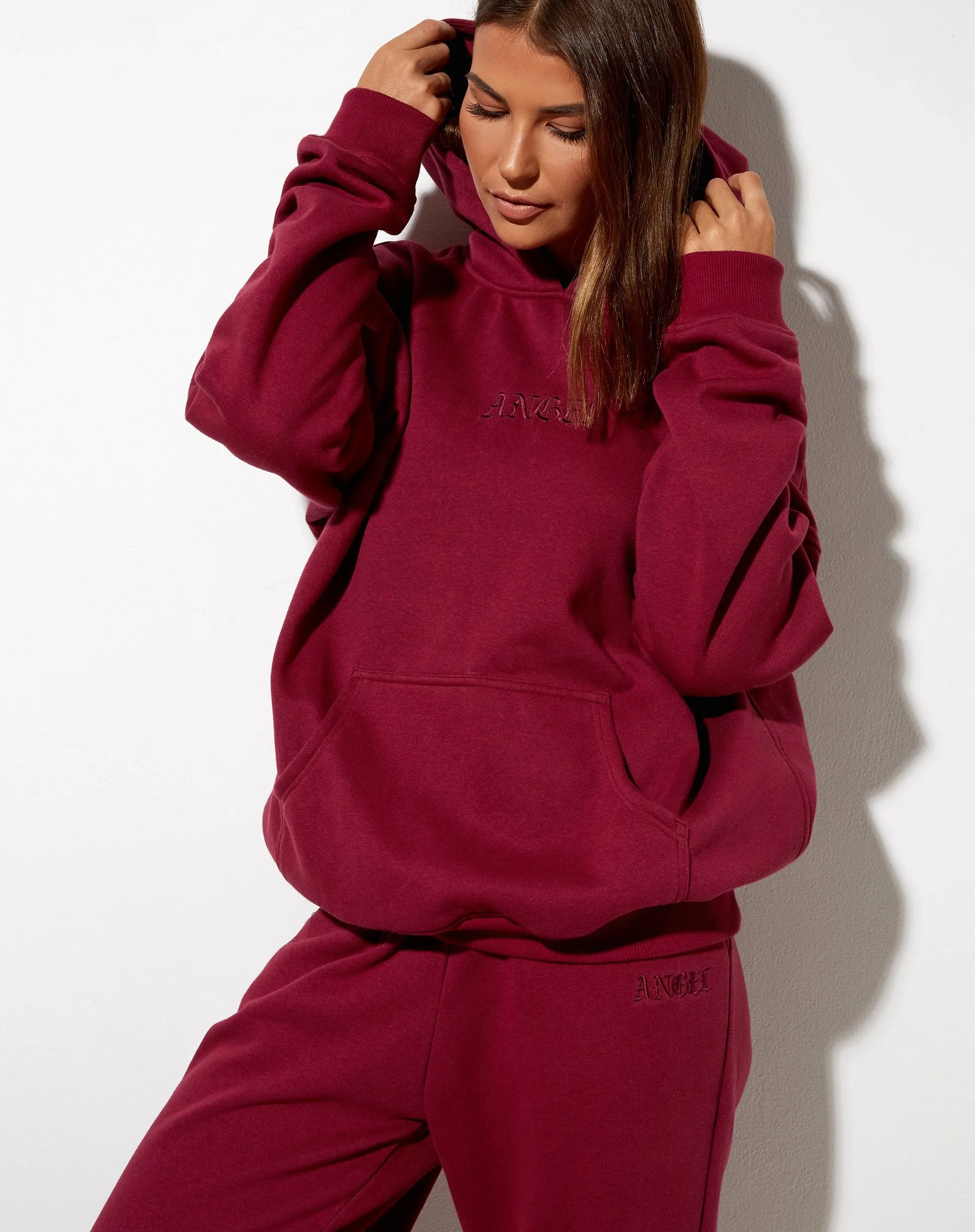Oversize Hoodie in Burgundy 'Angel' Embro sold by Motel Rocks