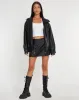 Sioni Wrap-Over Mini Skirt in PU Black sold by Motel Rocks