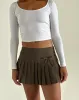 Carlita Pleated Mini Skirt with Bow in Light Brown sold by Motel Rocks