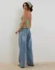 Tezza Tie Front Cami Top in Ditsy Floral Green sold by Motel Rocks