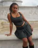 Skirza Pleated Mini Skirt in Tailoring Tartan Green sold by Motel Rocks