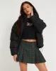 Skirza Pleated Mini Skirt in Tailoring Tartan Green sold by Motel Rocks