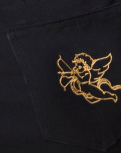 Mini Broomy Skirt in Black with Cherub Embro sold by Motel Rocks