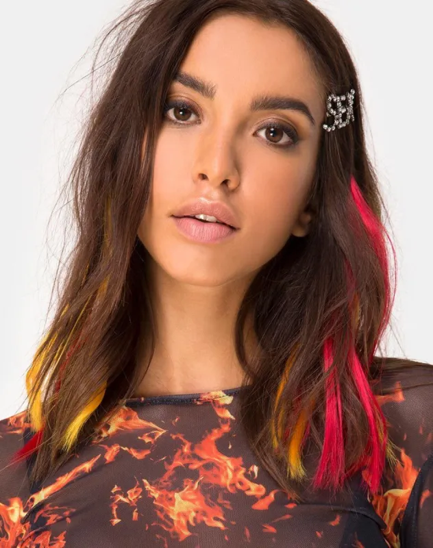 Hair Extension in Burnt Flame Orange by The Unicorn Glow sold by Motel Rocks