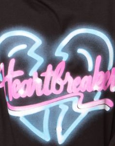 Sunny Kiss Tee in Black Heart Breaker sold by Motel Rocks