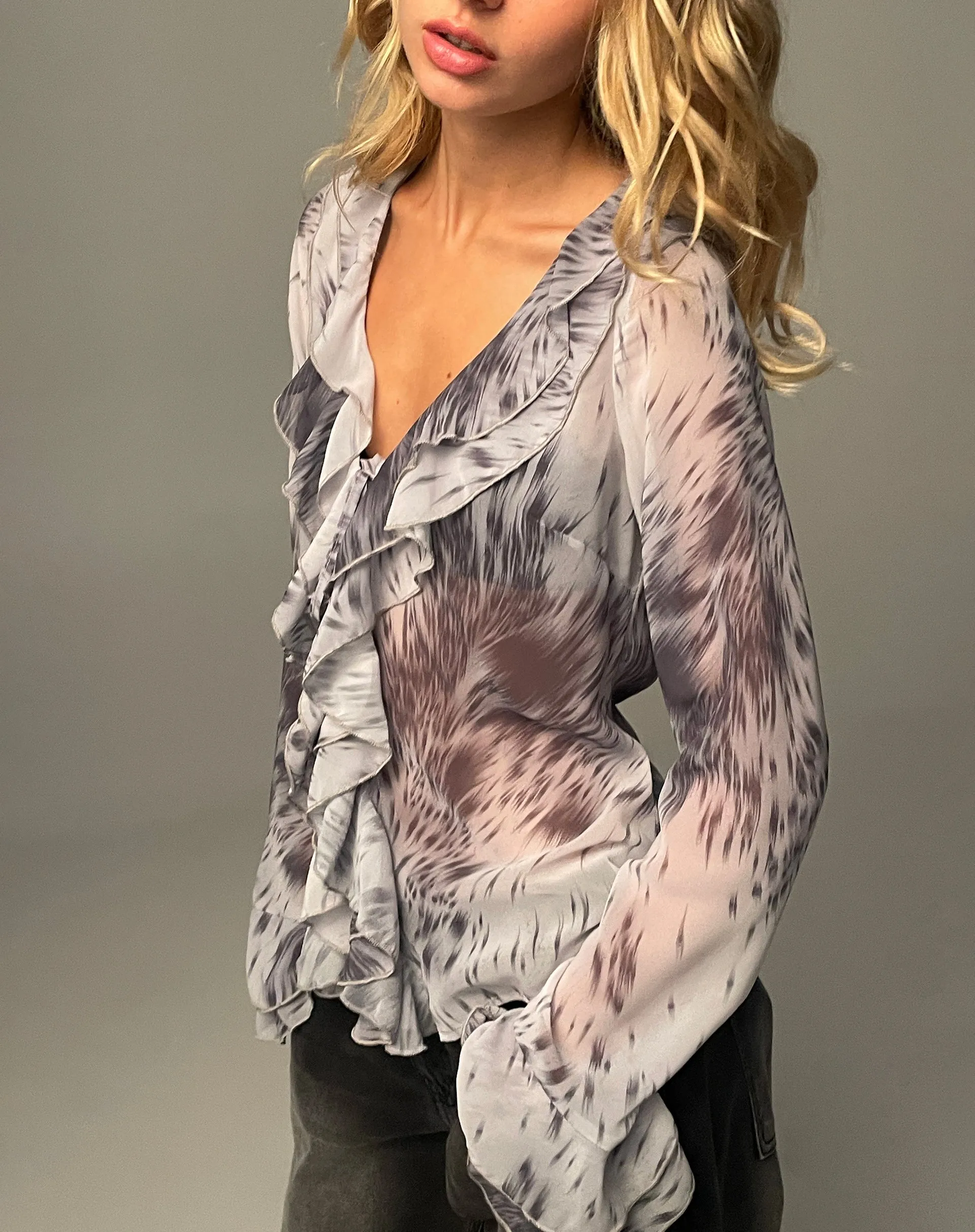 Cecelia Ruffle Detail Blouse in Distorted Animal Print sold by Motel Rocks