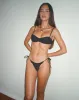 Lentra Bikini Bottom in Broderie Black with Ruffle sold by Motel Rocks