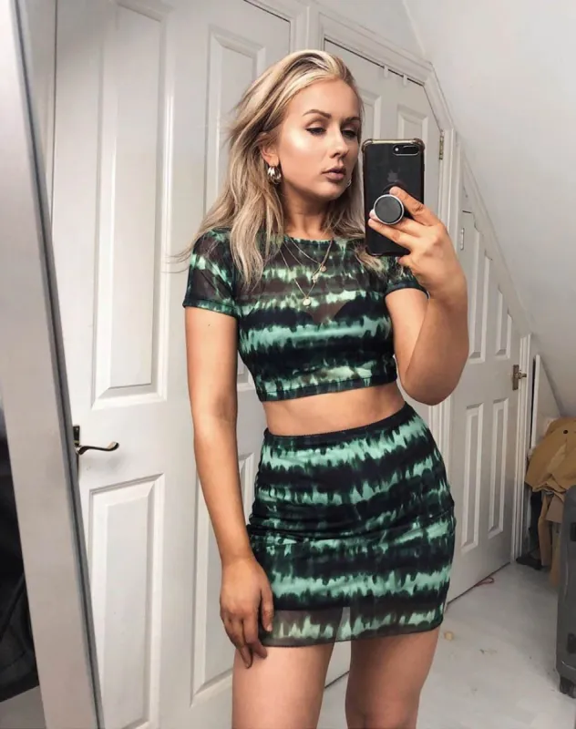 Kinnie Mini Skirt in Tie Dye Turquoise Mesh sold by Motel Rocks