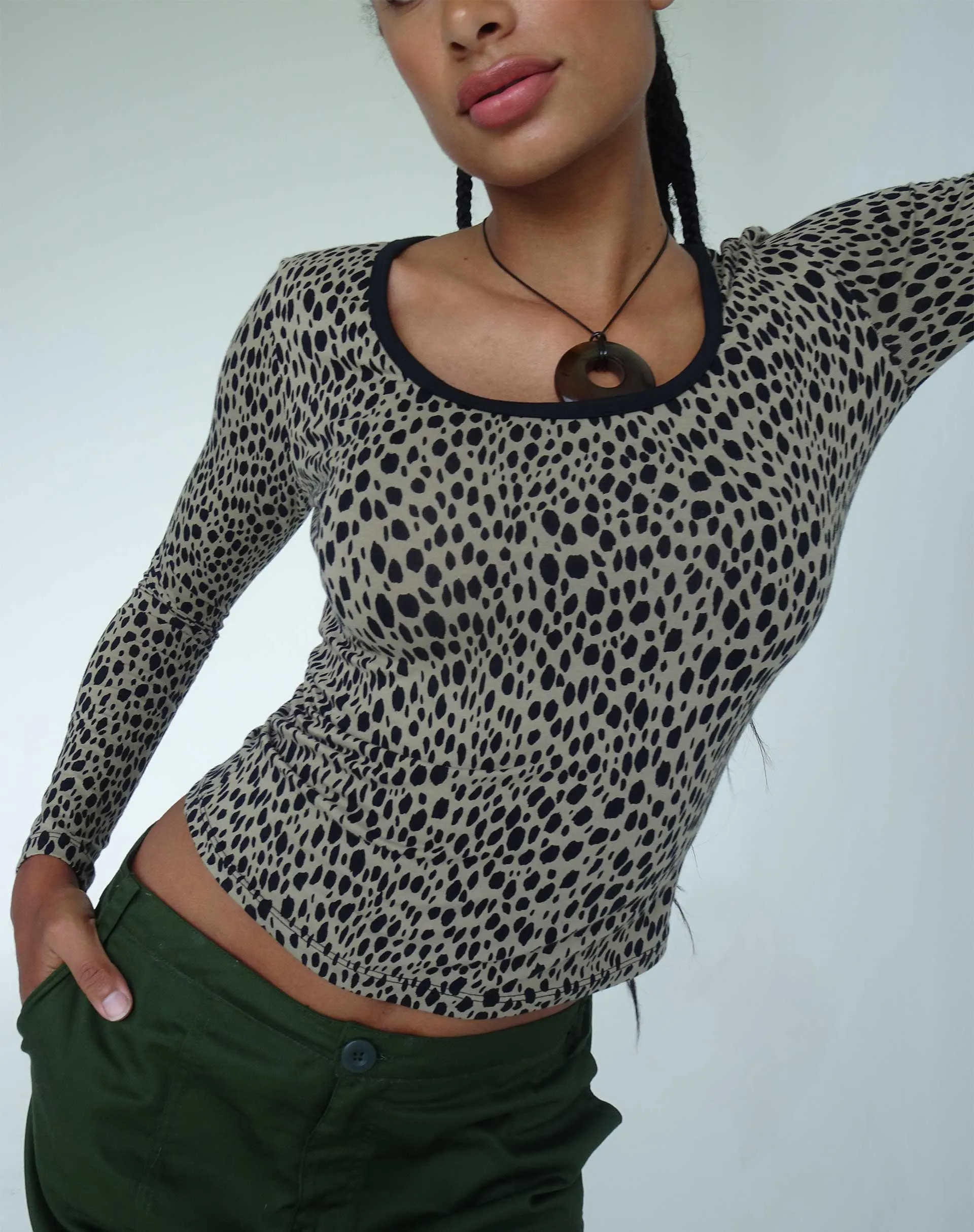 Beshi Long Sleeve Top in Mini Cheetah Black Binding sold by Motel Rocks