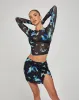 Pelma Mini Skirt in Butterfly Watercolour Black sold by Motel Rocks