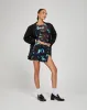Pelma Mini Skirt in Butterfly Watercolour Black sold by Motel Rocks