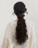 Scrunchie in Floral Land Black sold by Motel Rocks