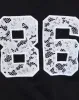 Blaine Oversized Tee in Black with 86 White Lace Embroidery sold by Motel Rocks
