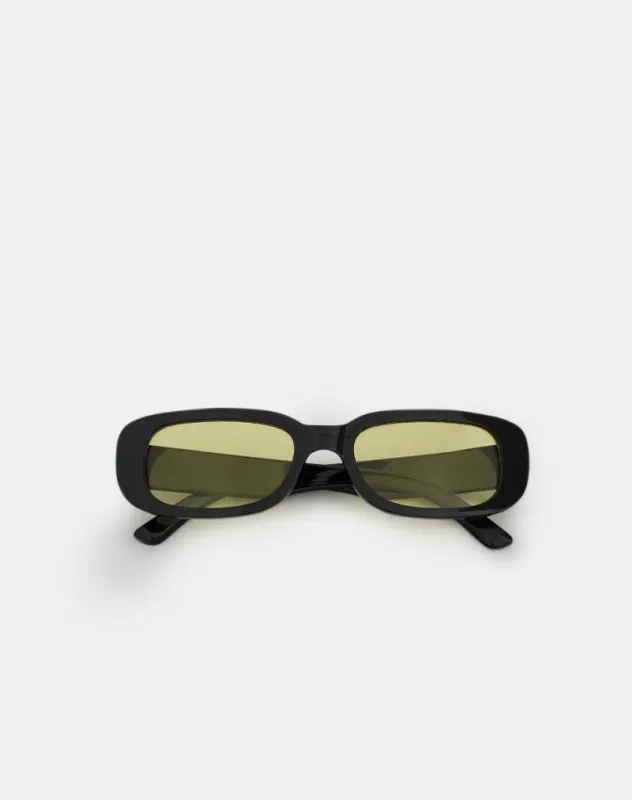 Rustina Sunglasses in Black with Yellow Lenses sold by Motel Rocks