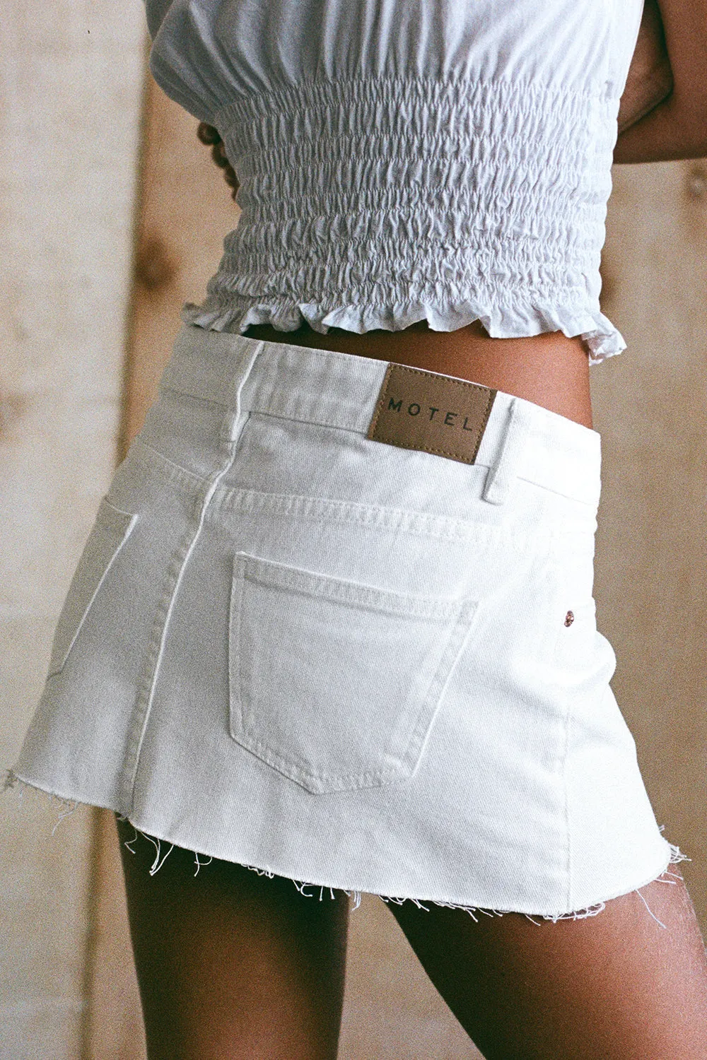 Raw Hem Denim Mini Skirt in True White sold by Motel Rocks product image thumbnail 2