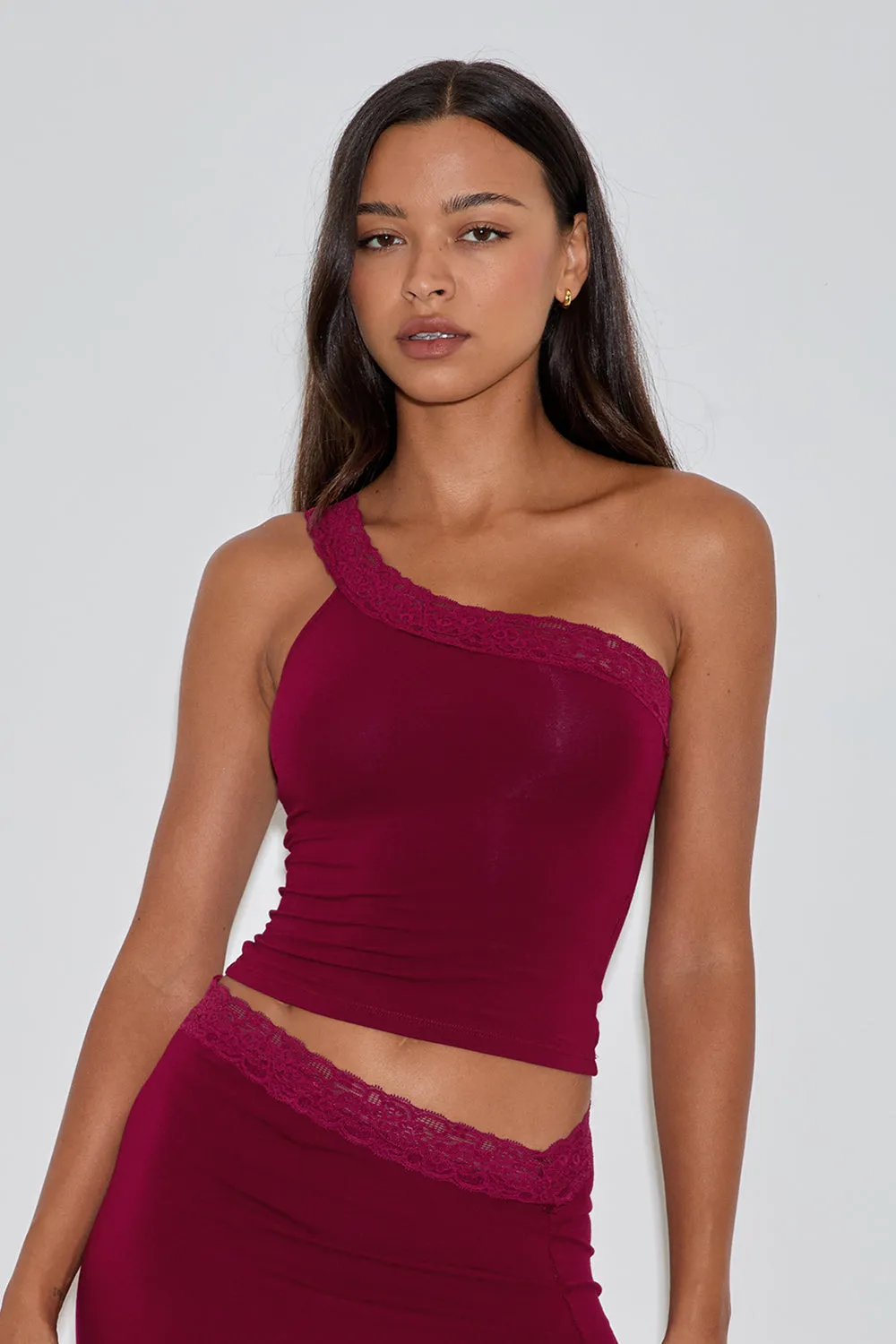 Cordia One Shoulder Top in Burgundy sold by Motel Rocks