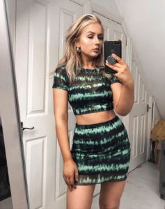 Kinnie Mini Skirt in Tie Dye Turquoise Mesh sold by Motel Rocks