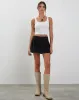 Adini Mini Skirt in Black Dobby sold by Motel Rocks