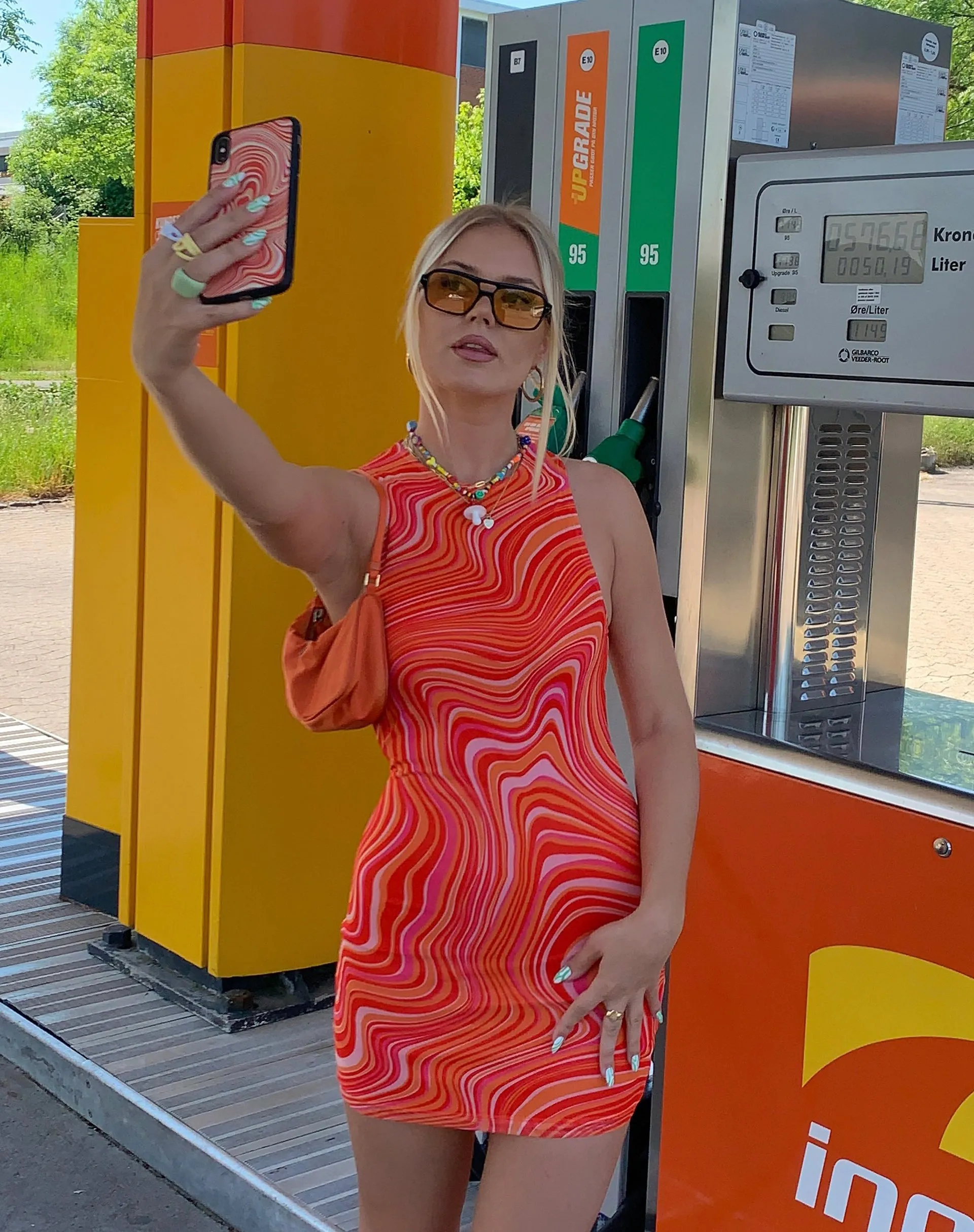 Brigitta Mini Dress in 70's Ripple Tangerine sold by Motel Rocks product image thumbnail 3