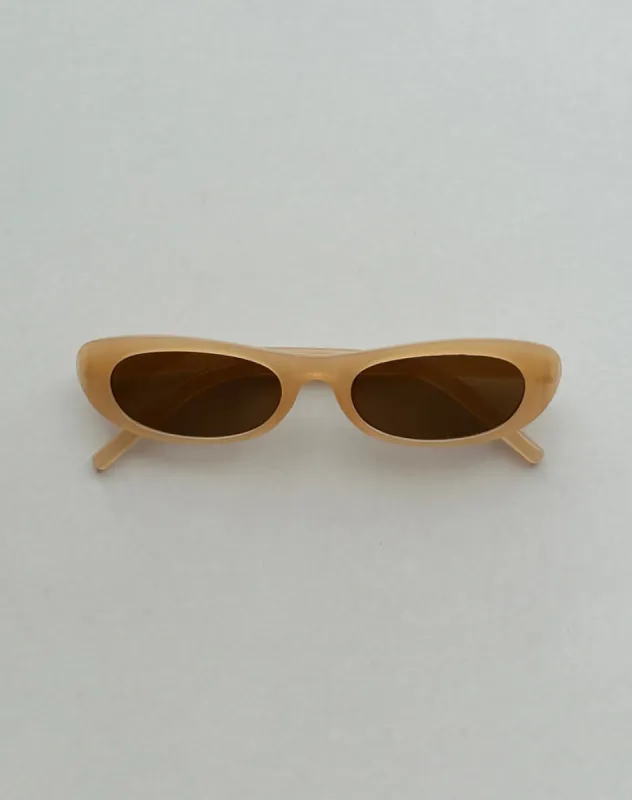 Rotu Rectangle Sunglasses in Opaque Tan made by Motel Rocks