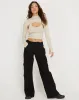 Raccet Long Sleeve Crop Top in Coconut Milk sold by Motel Rocks