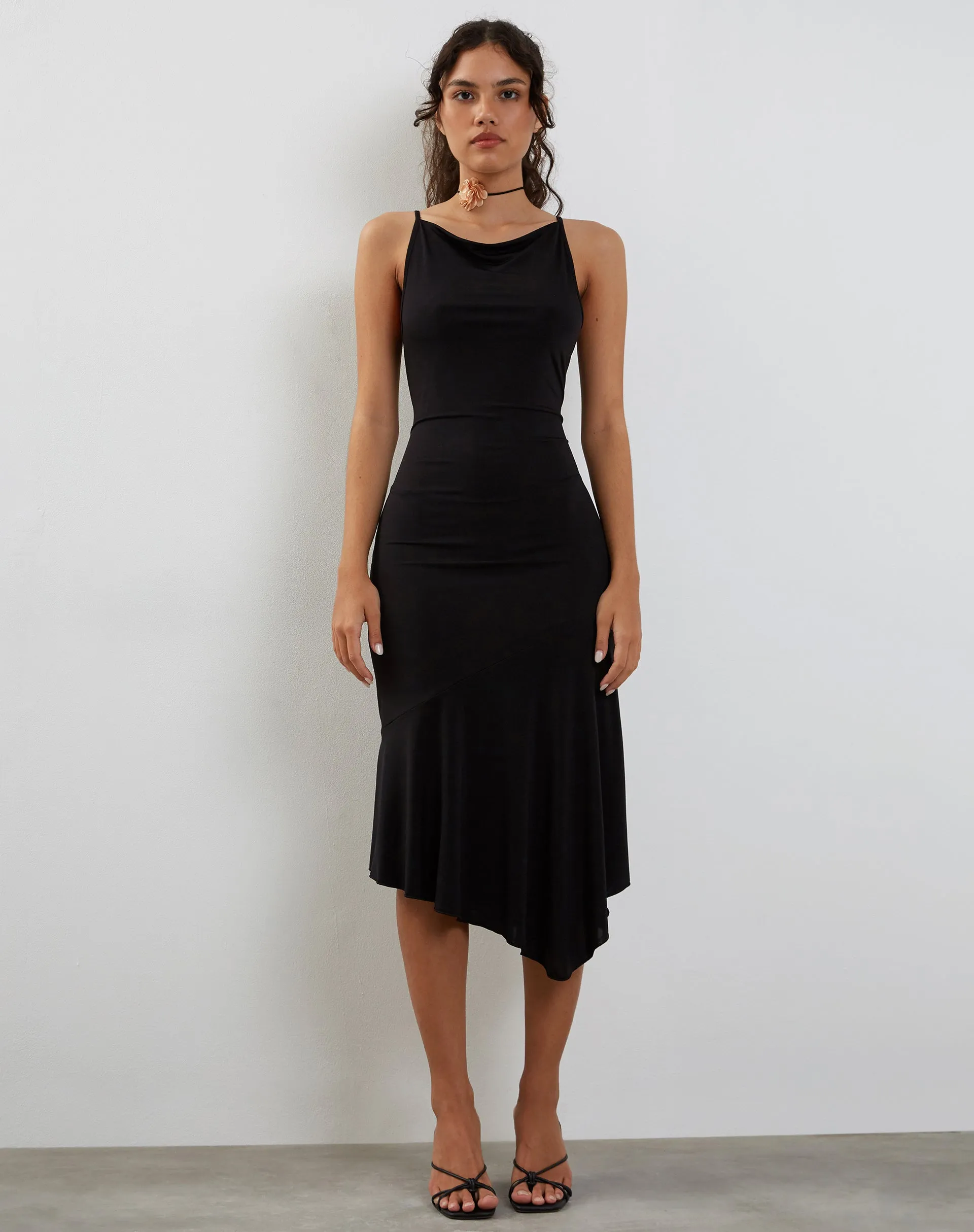 Adina Asymmetric Hem Midi Dress in Slinky Black sold by Motel Rocks