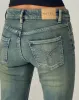 Low Rise Flared Jeans in Green Wash sold by Motel Rocks