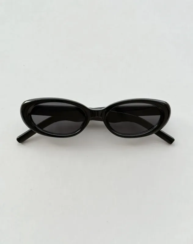 Imbri Oval Sunglasses in Black with Star made by Motel Rocks