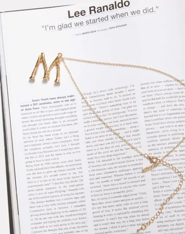 Necklace in Gold Letter M sold by Motel Rocks
